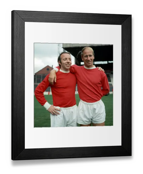 Framed Print : Manchester United footballers Nobby Stiles (left) and Bobby Charlton at Old Trafford 1969