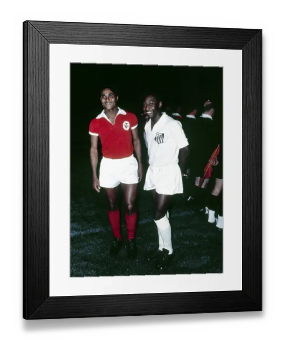Framed Print : Brazilian footballer Pele of club side Santos (right) poses with Portugal forward Eusebio