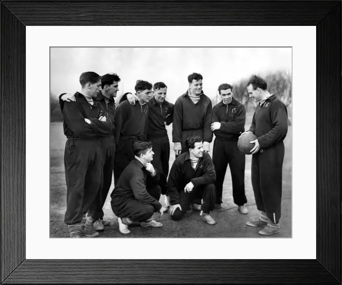 Framed Print : Oldam Athletic player manager George Hardwick (right) speaks to players during a training Framed Print : Oldam Athletic player manager George Hardwick (right) speaks to players during a training