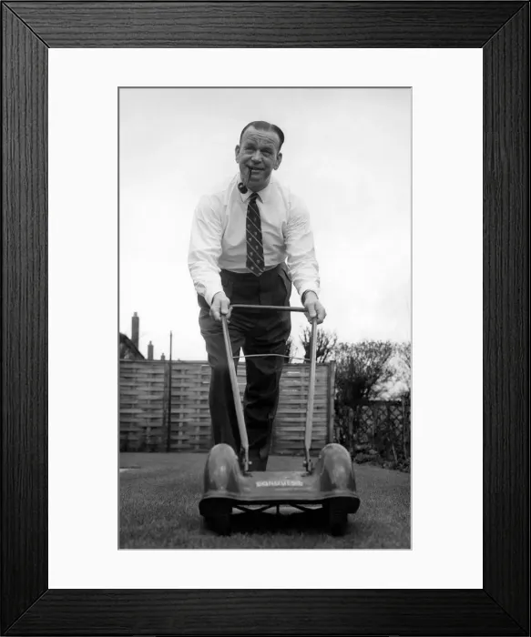Framed Print : Sacked Manchester City manager George Poyser pictured doing a spot of gardening at his Framed Print : Sacked Manchester City manager George Poyser pictured doing a spot of gardening at his