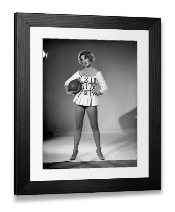 Framed Print : Woman (Shelia Robens) seen here dress in football costume. 1957