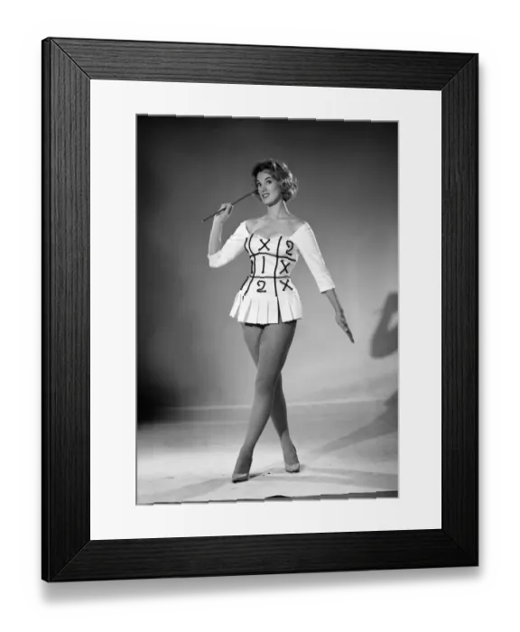Framed Print : Woman (Shelia Robens) seen here dress in football costume. 1957 Framed Print : Woman (Shelia Robens) seen here dress in football costume. 1957