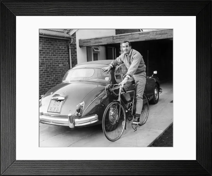 Framed Print : Gerry Byrne, Liverpools international full back, leaves his Jag in the drive Framed Print : Gerry Byrne, Liverpools international full back, leaves his Jag in the drive
