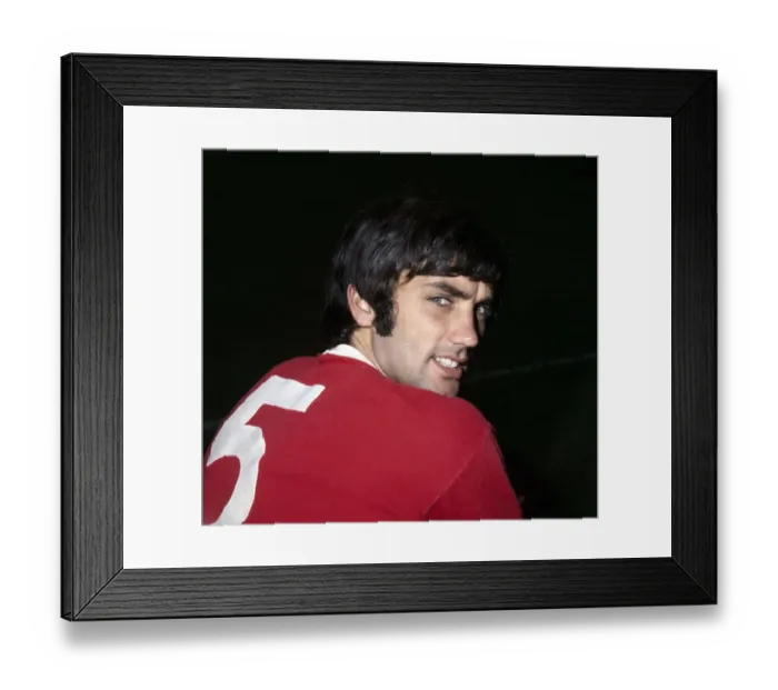 Framed Print : Manchester United footballer George Best poses at Old Trafford Circa 1965