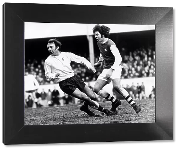 Jimmy Greaves of Tottenham Hotspur and England in action for Spurs against Arsenal in