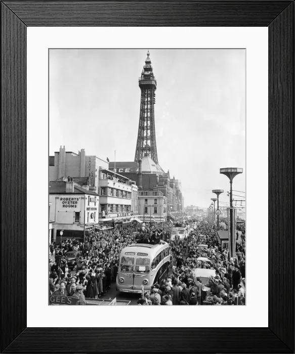 Framed Print : Blackpool arrive home with FA Cup. Coach passes along the promenade by the tower
