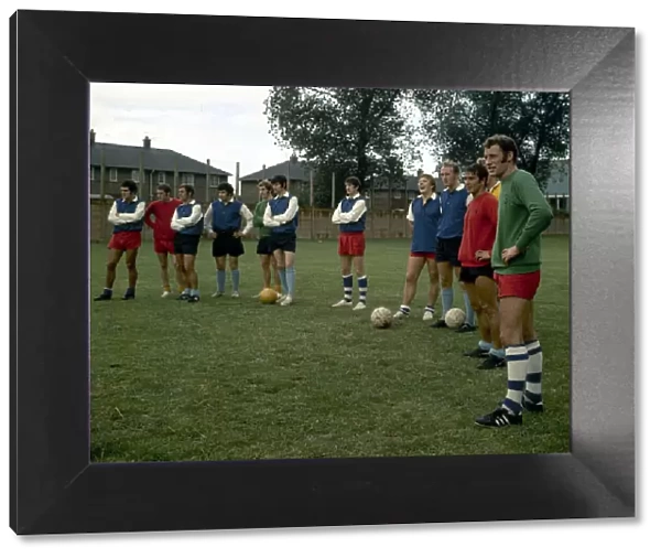 Hull City manager Terry Neill talkes a training session with his team July 1970
