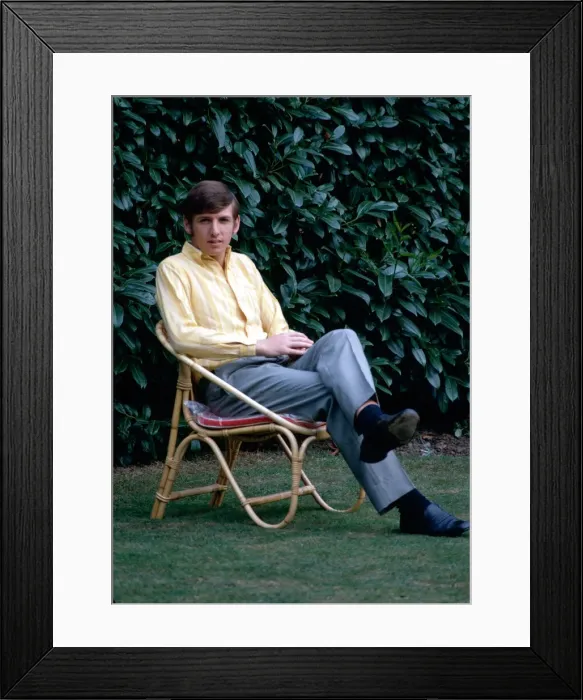 Framed Print : West Ham United footballer Martin Peters relaxes sitting on a deckchair October