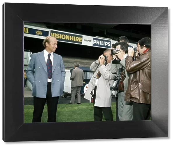 New Preston North End manager Bobby Charlton meets press cameramen at the club