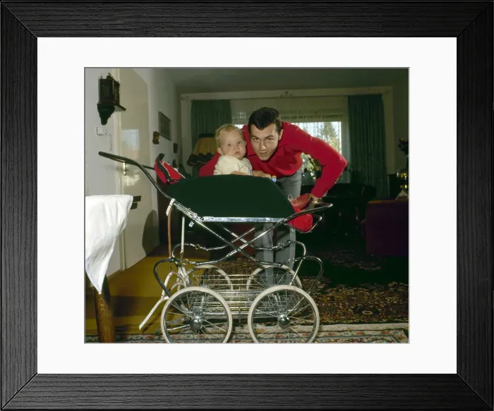 Framed Print : Captain of the West Germany football team Franz Beckenbauer pictured at home with his son