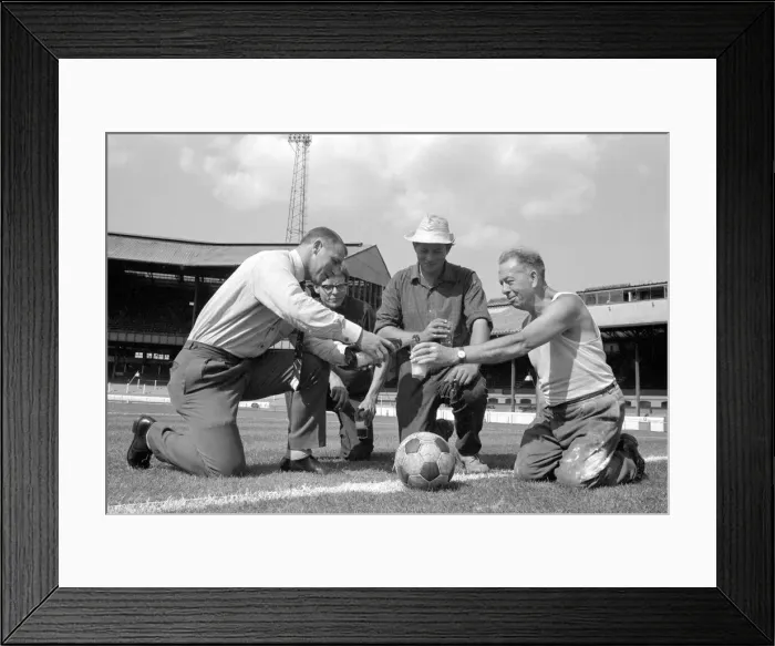 Framed Print : Chelsea manager Tommy Docherty christens the centre spot of the Stamford Bridge pitch Framed Print : Chelsea manager Tommy Docherty christens the centre spot of the Stamford Bridge pitch