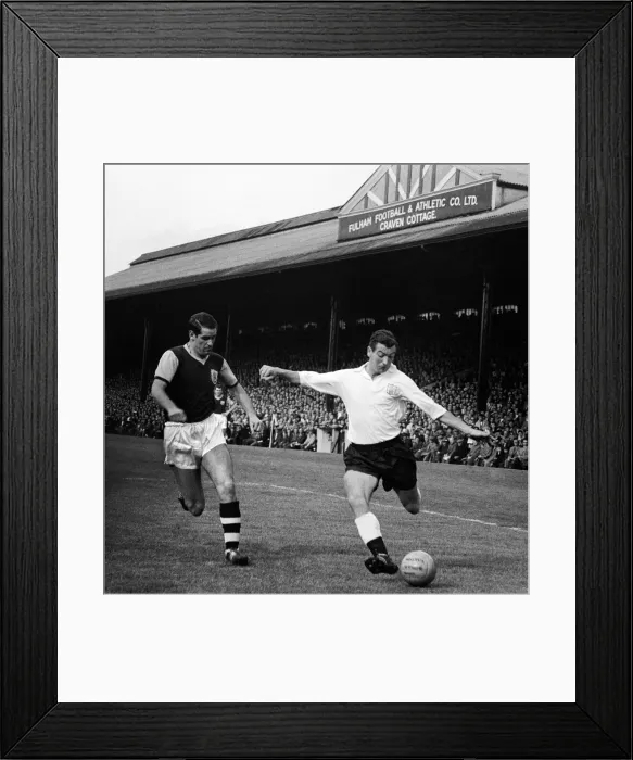Framed Print : Johnny Haynes of Fulham in action against Burmely during their League division one match Framed Print : Johnny Haynes of Fulham in action against Burmely during their League division one match