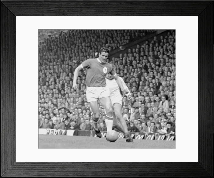 Framed Print : Gerry Byrne of Liverpool is chased for the ball by Terry Anderson of Arsenal during