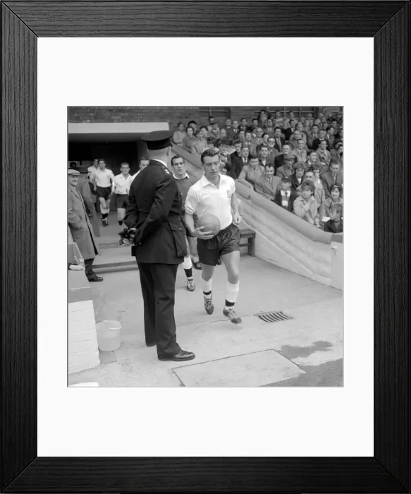 Framed Print : Johnny Haynes of Fulham leading his team out for a league division one match at Craven Framed Print : Johnny Haynes of Fulham leading his team out for a league division one match at Craven