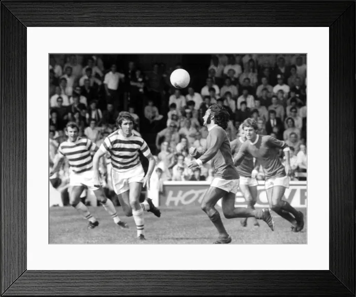 Framed Print : Reading v. Manchester United. Danger for Reading as George Best heads on a pass