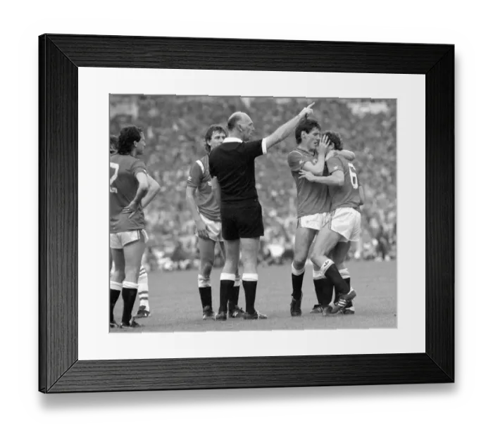 Framed Print : Distraught Manchester United footballer Kevin Moran is consoled by teammate Frank