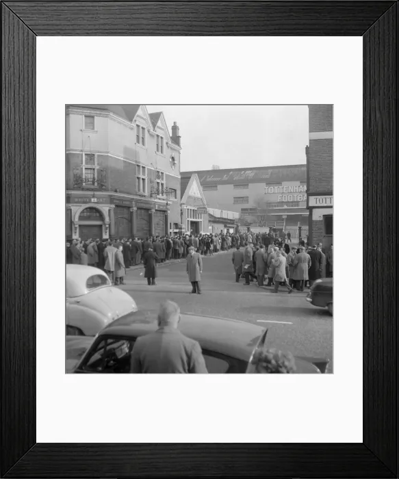 Framed Print : Tottenham supporters queue outside White Hart Lane for tickets to their European Cup