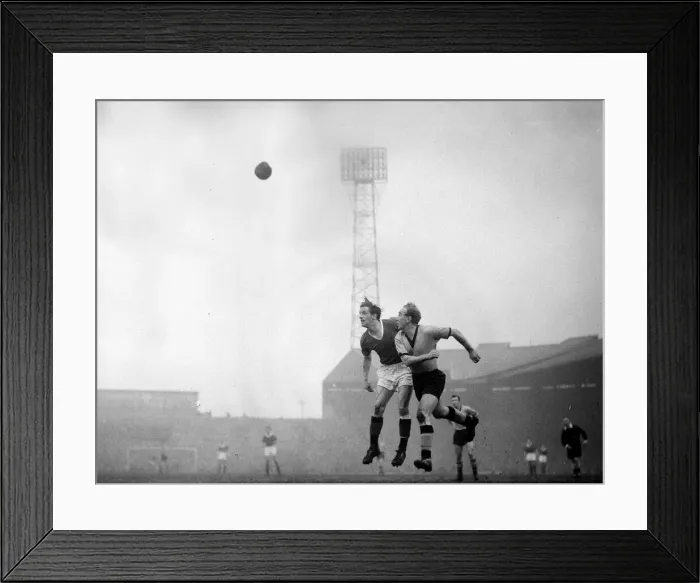 Framed Print : Manchester United v Wolverhampton Wanderers Billy Wright beats Denis Viollet in Framed Print : Manchester United v Wolverhampton Wanderers Billy Wright beats Denis Viollet in