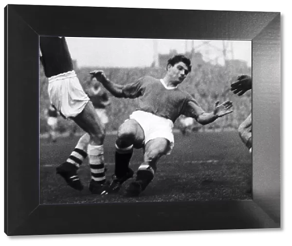 Duncan Edwards of Manchester United makes a sliding tackle 1957