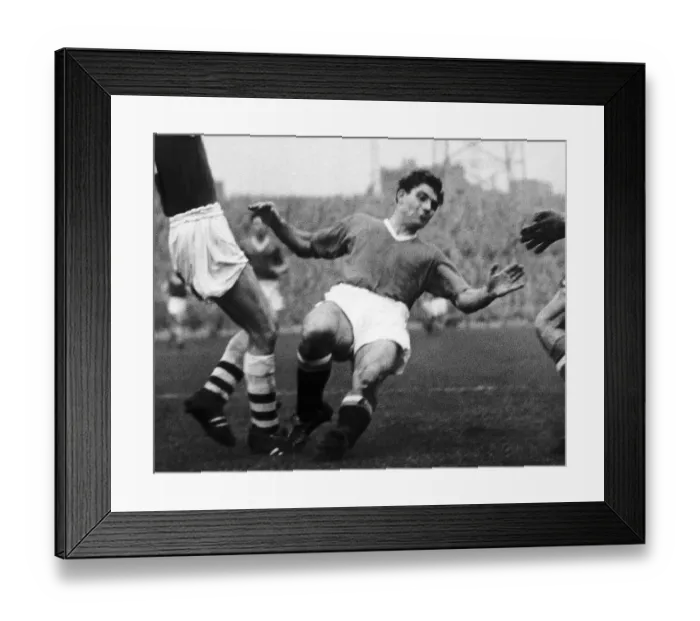 Framed Print : Duncan Edwards of Manchester United makes a sliding tackle 1957 Framed Print : Duncan Edwards of Manchester United makes a sliding tackle 1957