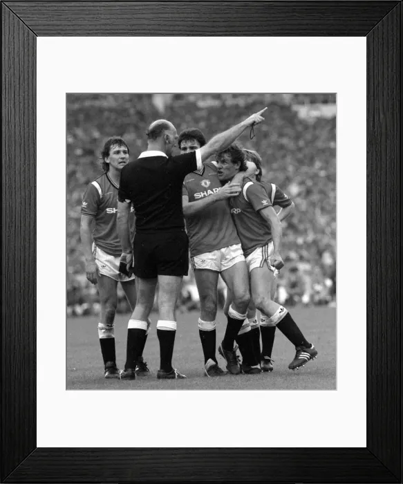 Framed Print : Distraught Manchester United footballer Kevin Moran is consoled by teammate Frank