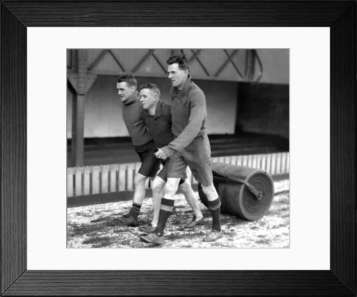 Framed Print : Bradford City FC. Cookson, Pringle and Clough pulling a roller in the snow Framed Print : Bradford City FC. Cookson, Pringle and Clough pulling a roller in the snow