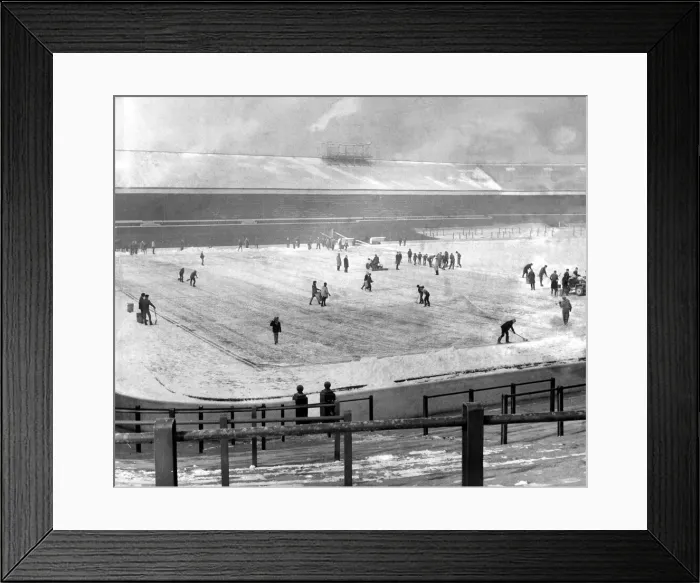 Framed Print : Blackburn Rovers Ground under clearance. Ground staff, volunteers Framed Print : Blackburn Rovers Ground under clearance. Ground staff, volunteers