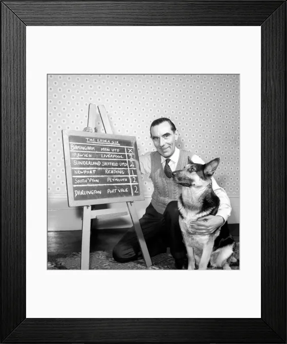 Framed Print : Bob Smith and his alsatian dog who helps him pick his football pools. 1957 Framed Print : Bob Smith and his alsatian dog who helps him pick his football pools. 1957