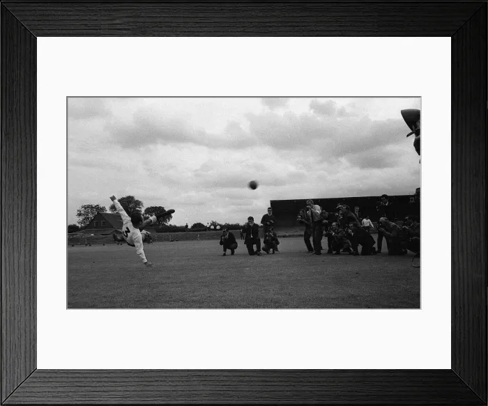 Framed Print : Jimmy Greaves of Spurs puts on show for the press doing a scissor kick at the spurs photo Framed Print : Jimmy Greaves of Spurs puts on show for the press doing a scissor kick at the spurs photo