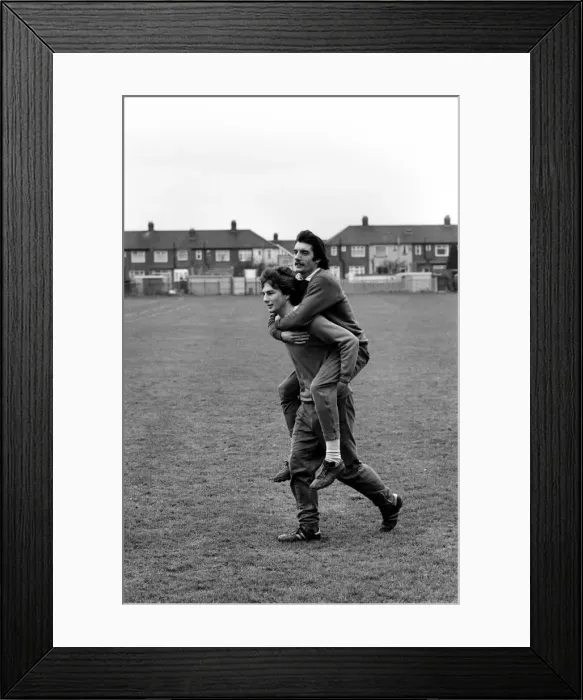Framed Print : Sport: Football: West Ham Training. Bill Landsowne carries Alan Devonshire piggy back Framed Print : Sport: Football: West Ham Training. Bill Landsowne carries Alan Devonshire piggy back