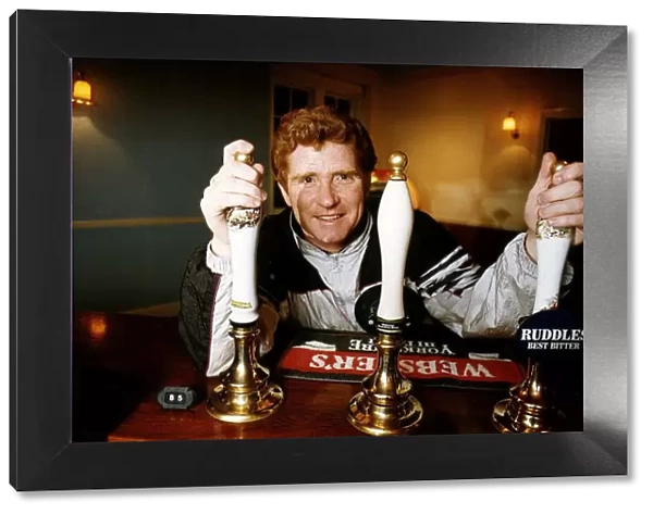 1966 World Cup Player Alan Ball behind the pumps in his new pub April 1991