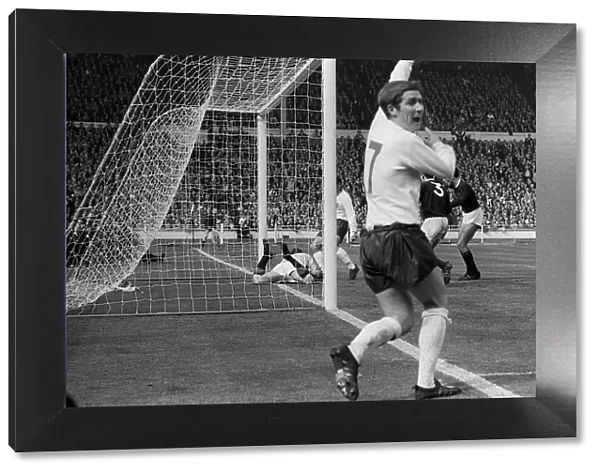 Alan Ball celebrates during the International friendly fixture against Scotland at