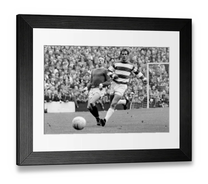 Framed Print : QPR v Manchester United Nobby Stiles chases fater rthe ball during the two
