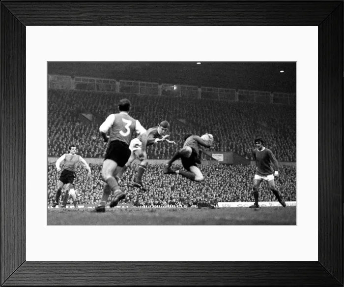Framed Print : Sheffield Wednesday goalkeeper Ron Springett makes a flying save to prevent the ball Framed Print : Sheffield Wednesday goalkeeper Ron Springett makes a flying save to prevent the ball