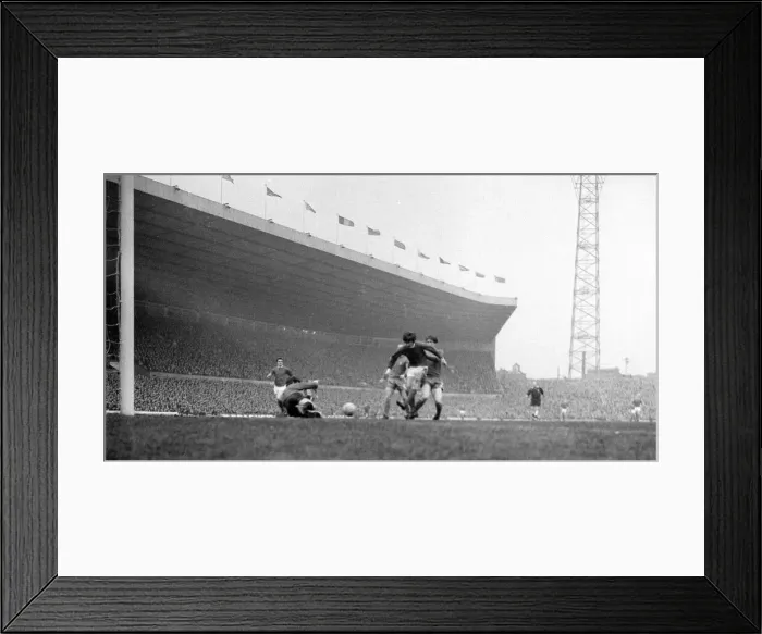 Framed Print : Manchester United forward George Best has his shot saved at point blank range by Chelsea