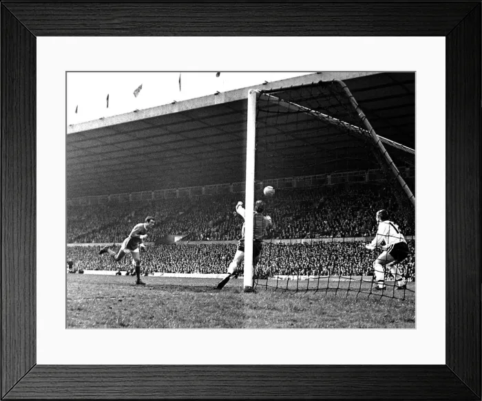 Framed Print : Manchester Uniteds John Aston heads past Fulham goalkeeper Ian Seymour to score his Framed Print : Manchester Uniteds John Aston heads past Fulham goalkeeper Ian Seymour to score his