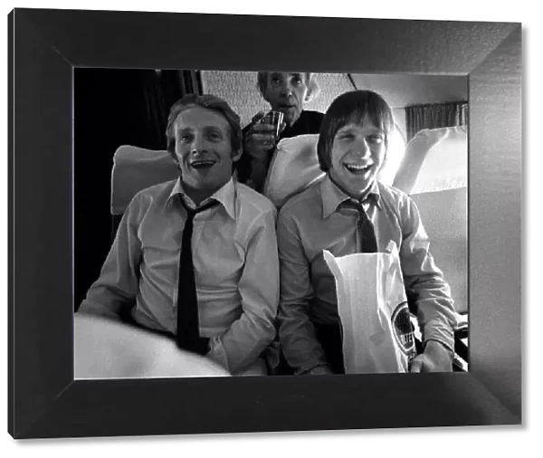 Manchester United players Denis Law and John Fitzpatrick returning from Milan April