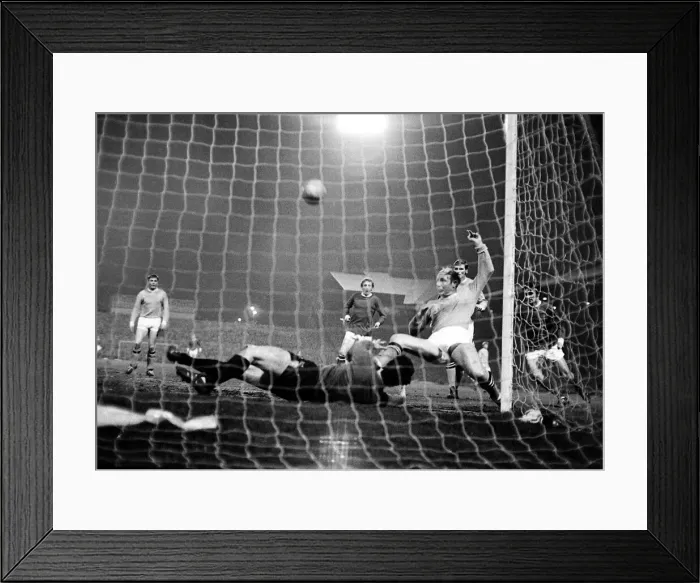 Framed Print : Manchester United forwards Denis Law and George Best cause confusion in the Manchester