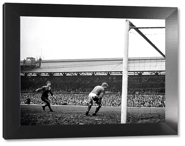 Sunderland goalkeeper Jim Montgomery can only watch a shot from Nobby Stiles which