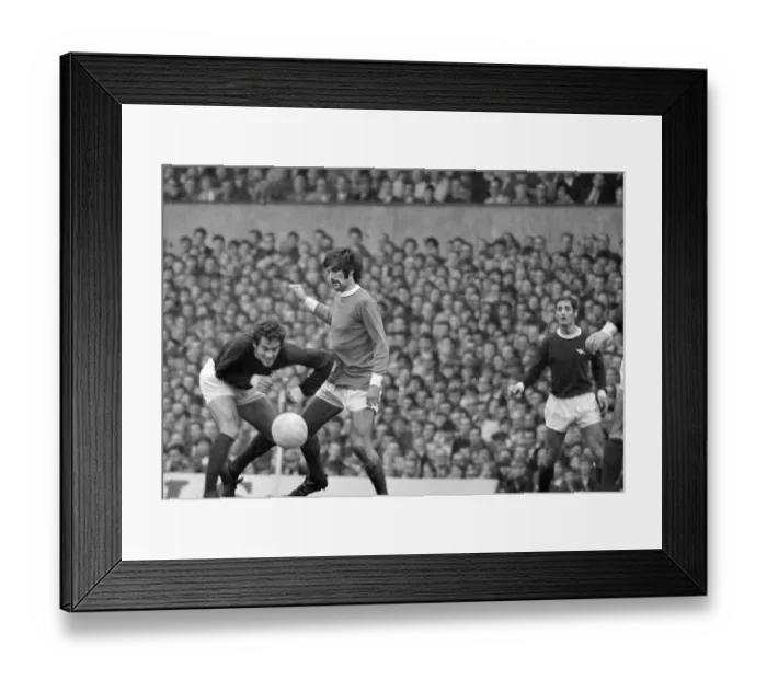 Framed Print : Manchester United star George Best on the ball during the league match against Arsenal