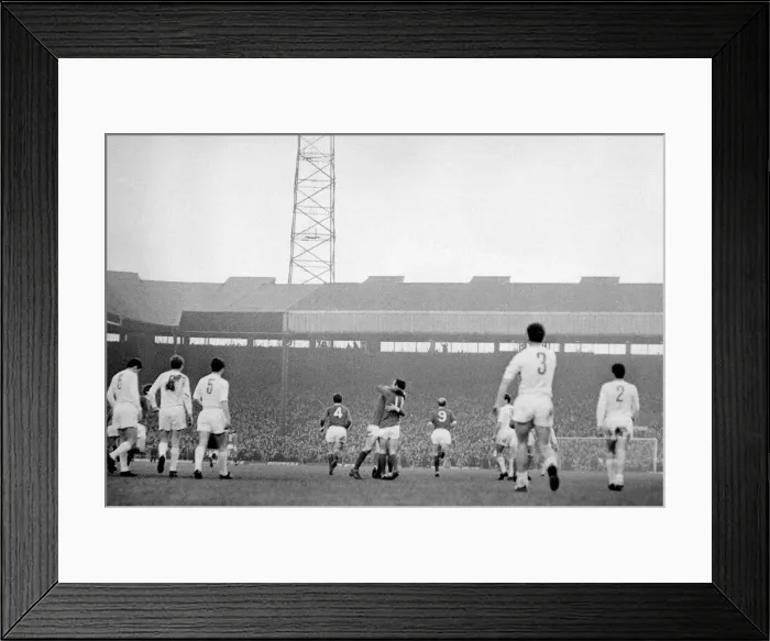 Framed Print : Manchester United players celebrate a goal by George Best against Real Madrid in Framed Print : Manchester United players celebrate a goal by George Best against Real Madrid in
