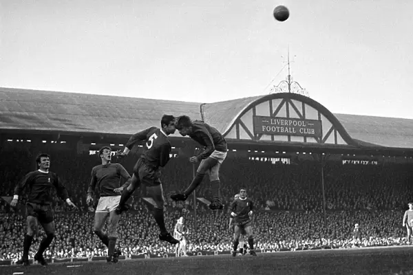 Liverpool forward Ron Yeats and Manchester Uniteds John Fitzpatrick in ahigh ball