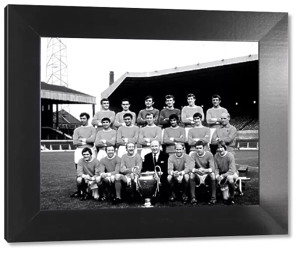 Manchester United football team pose for a group photo with European Cup at Old Trafford