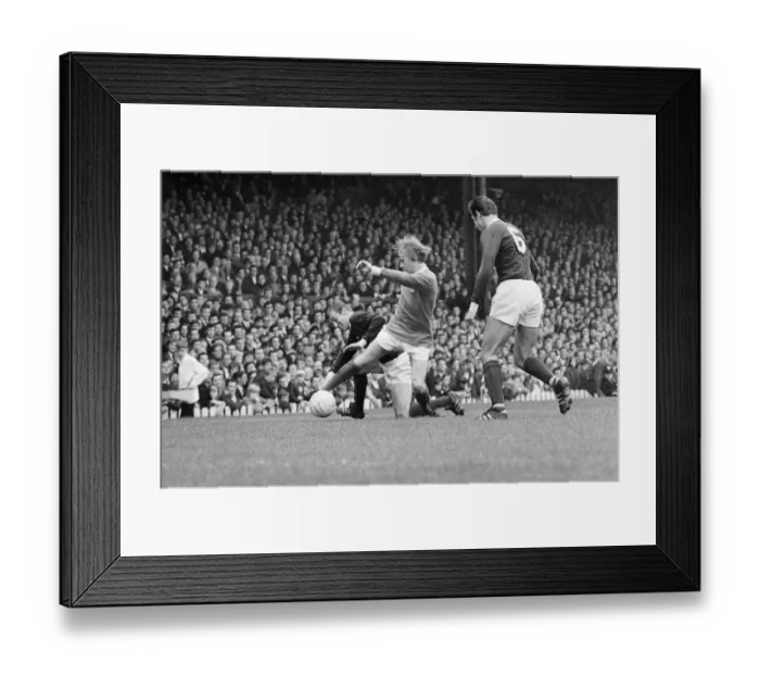 Framed Print : Manchester Uniteds John Fitzpatrick goes in for a challenge during the league match