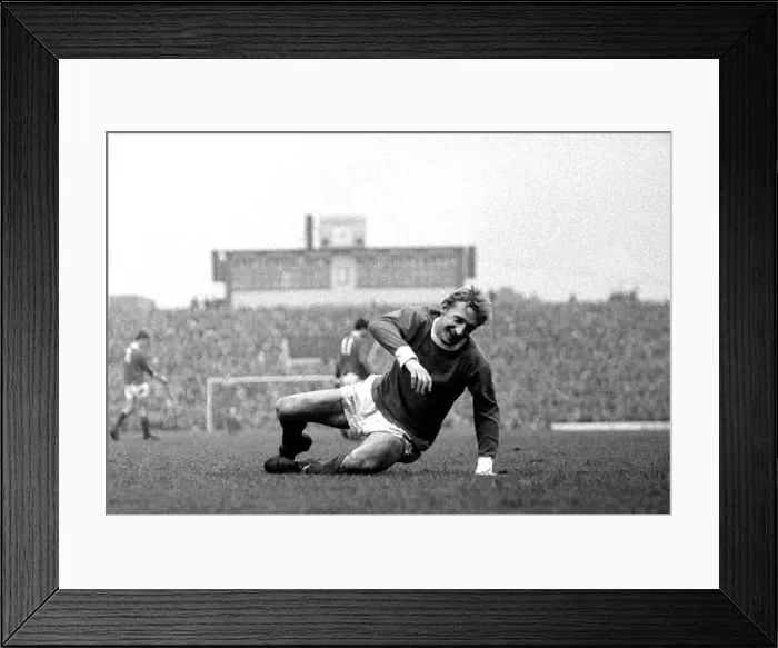 Framed Print : Denis Law of Manchester United during the league match with Sheffield Wednesday at Old Framed Print : Denis Law of Manchester United during the league match with Sheffield Wednesday at Old