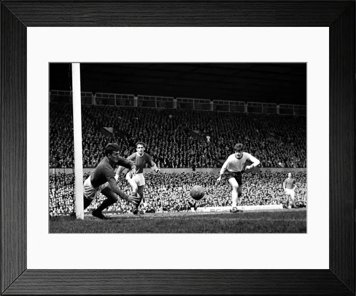 Framed Print : Manchester United goalkeeper Alec Stepney flings himself at the ball to save a fierce