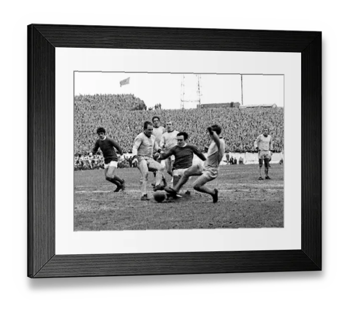 Framed Print : John Aston of Manchester United takes the ball between Maurice Setter (left
