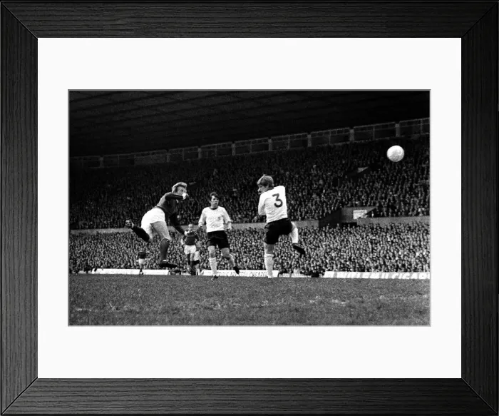 Framed Print : Manchester United forward Denis Law scores the winning goal with a flying header during