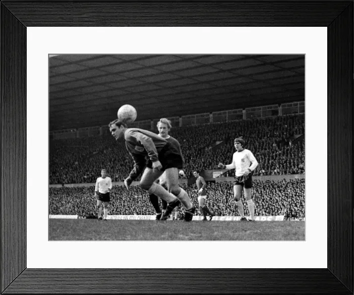 Framed Print : Denis Law of Manchester United putting pressure on Sheffield United goalkeeper Alan Framed Print : Denis Law of Manchester United putting pressure on Sheffield United goalkeeper Alan