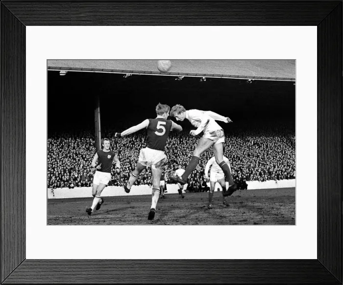 Framed Print : Manchester United footballer Denis Law gets in before Burnley defender Colin Waldron to Framed Print : Manchester United footballer Denis Law gets in before Burnley defender Colin Waldron to